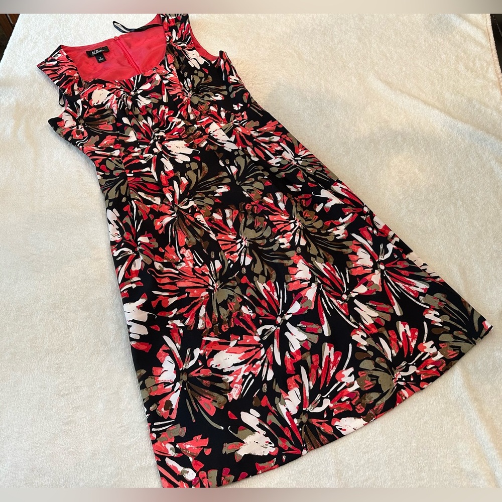 Cute coral flowered dress from AGB, size 6.